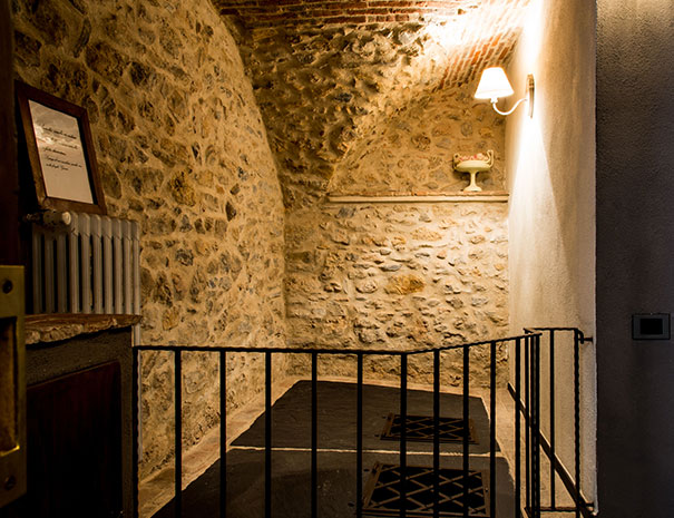 Camera con vasche di decantazione